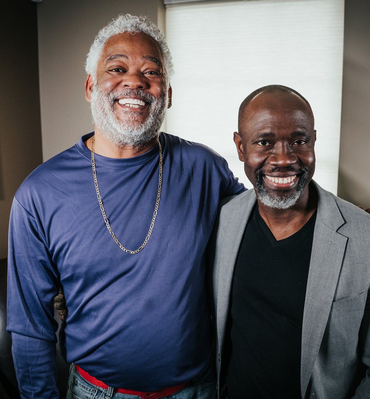 A New York Dental Implants patient and Dr. Charles celebrating a new same-day smile