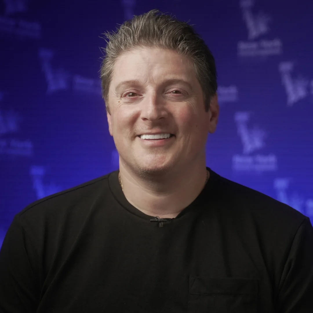 Mark H. after full arch restoration treatment at New York Dental Implants