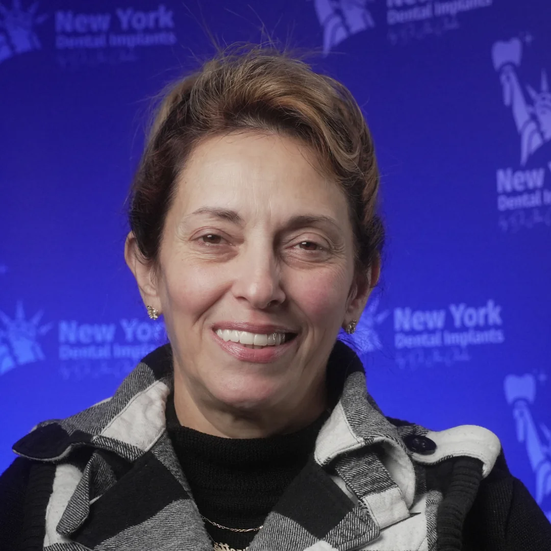 Lizette P. after smile makeover treatment at New York Dental Implants