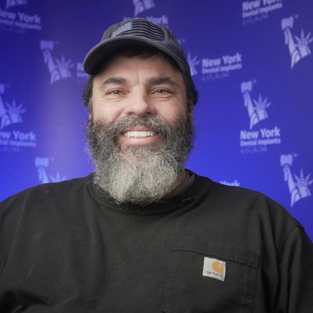 Raymond Z. after full reconstruction treatment at New York Dental Implants