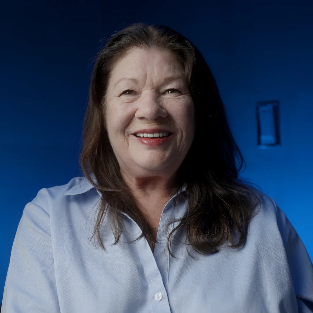 Karen R. after implant bridge treatment at New York Dental Implants